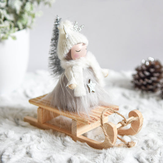 Cosy Christmas Girl on Wooden Sledge